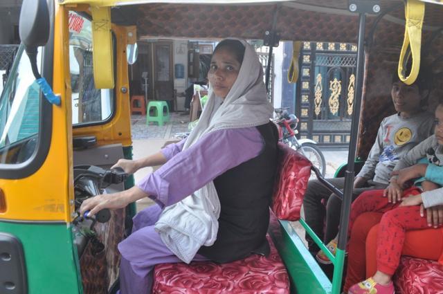 Tabassum Bano driving a three-wheeler in Allahabad. (HT Photo) Tabassum Bano driving a three-wheeler in Allahabad. (HT Photo)