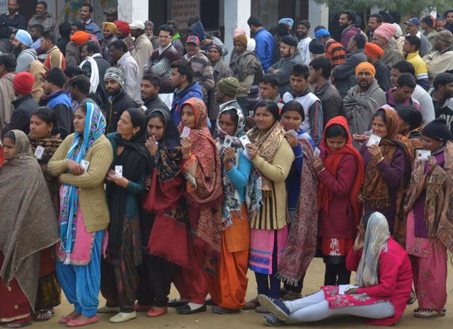 Voters pose for photographers as they queue to cast their ballots in the Punjab assembly and Amritsar Lok Sabha elections at a polling booth in a village on the outskirts of Amritsar on February 4, 2017. (AFP Photo) Voters pose for photographers as they queue to cast their ballots in the Punjab assembly and Amritsar Lok Sabha elections at a polling booth in a village on the outskirts of Amritsar on February 4, 2017. (AFP Photo)