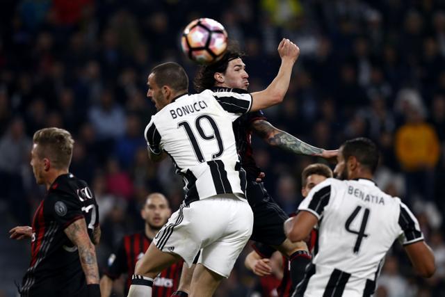 A controversial penalty was awarded in injury time to Juventus for handball by Mattia De Sciglio. (AFP) A controversial penalty was awarded in injury time to Juventus for handball by Mattia De Sciglio. (AFP)