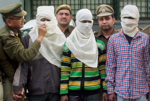 Delhi Police show the three accused involved in the burglary at Noble Laureate Kailash Satyarthi's house at PHQ in New Delhi on Sunday. (PTI)