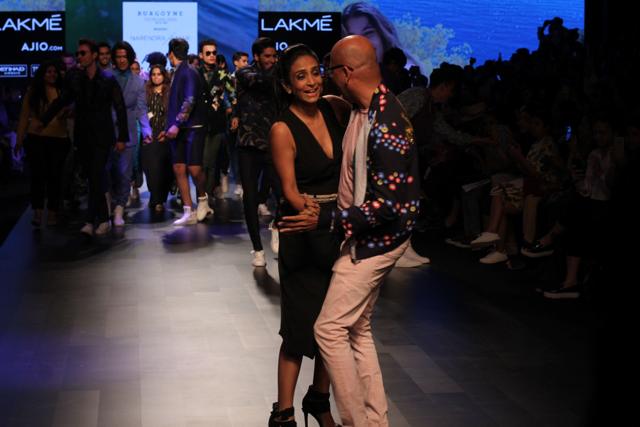 Actor Suchitra Pillai danced with fashion designer Narendra Kumar on the ramp at Lakmé Fashion Week Summer/Resort 2017. (Pramod Thakur/HT Photo)