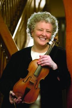Juilliard415’s artistic advisor and Baroque violinist Monica Huggett with a Stradivari violin. Juilliard415’s artistic advisor and Baroque violinist Monica Huggett with a Stradivari violin.