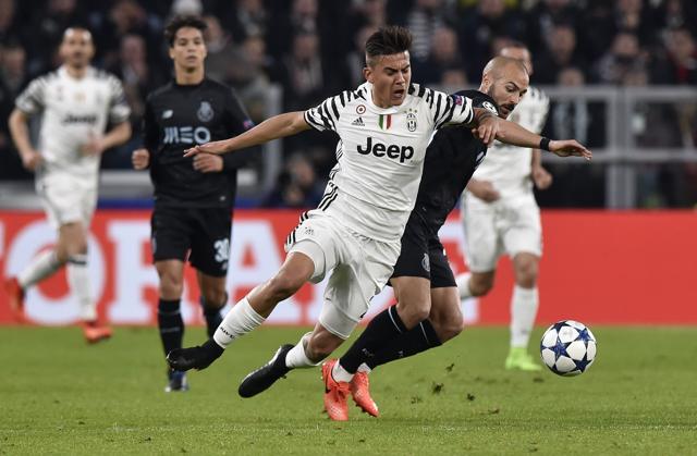FC Porto's Andre Andre in action with Juventus' Paulo Dybala. (REUTERS) FC Porto's Andre Andre in action with Juventus' Paulo Dybala. (REUTERS)
