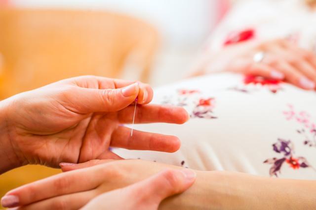 During pregnancy, acupuncture has been used to treat nausea. (Shutterstock)