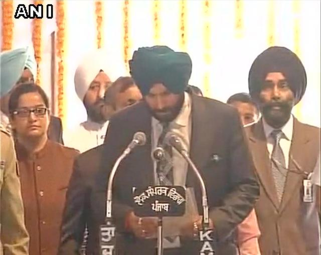 Navjot Singh Sidhu taking oath. The cricketer-turned-politician took oath in Punjabi. (ANI)