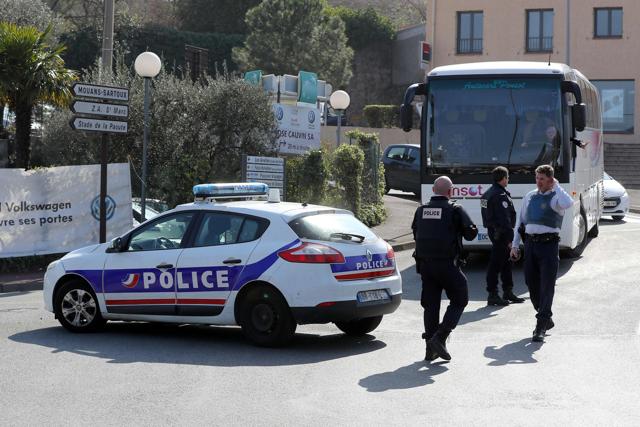 Police officers control traffic near the Tocqueville high school in Grasse, southwestern France, after the shooting incident. (AFP) Police officers control traffic near the Tocqueville high school in Grasse, southwestern France, after the shooting incident. (AFP)
