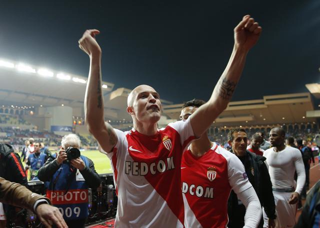 Monaco's Andrea Raggi celebrates after the game against Manchester City. (REUTERS) Monaco's Andrea Raggi celebrates after the game against Manchester City. (REUTERS)