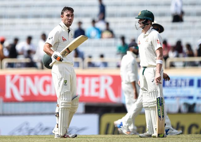 Australian batsman Glenn Maxwell (L) celebrates his maiden century as captain Steve Smith watches in Ranchi on Friday. (AFP) Australian batsman Glenn Maxwell (L) celebrates his maiden century as captain Steve Smith watches in Ranchi on Friday. (AFP)