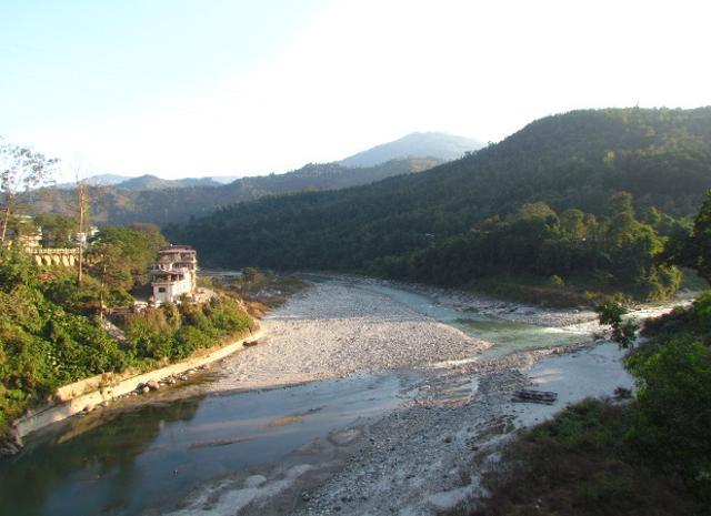 In the border-town of Jorethang, about 70 km from Sikkim’s capital Gangtok, police officers stand guard by the river Rangeet because across the river and past a dense forest lies West Bengal. Jorethang residents can cross over by foot or by boat to buy cheap, easily available pharmaceutical drugs. (Indiaspend) In the border-town of Jorethang, about 70 km from Sikkim’s capital Gangtok, police officers stand guard by the river Rangeet because across the river and past a dense forest lies West Bengal. Jorethang residents can cross over by foot or by boat to buy cheap, easily available pharmaceutical drugs. (Indiaspend)