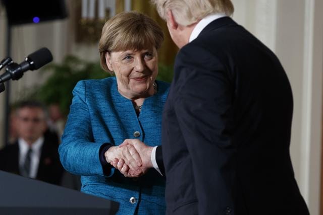 US President Donald Trump shakes hands with German Chancellor Angela Merkel during a news conference in the White House on Friday. (AP) US President Donald Trump shakes hands with German Chancellor Angela Merkel during a news conference in the White House on Friday. (AP)