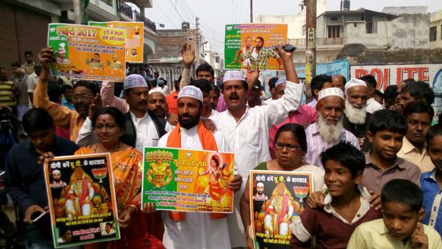 People celebrate ahead of Yogi Adityanath’s swearing-in ceremony, in Gorakhpur. (HT Photo) People celebrate ahead of Yogi Adityanath’s swearing-in ceremony, in Gorakhpur. (HT Photo)