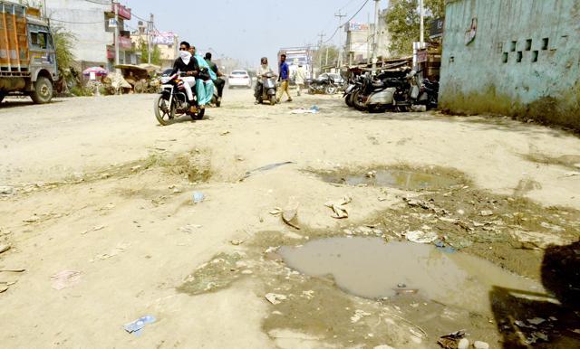 The road is one of the prominent routes to enter the city and traffic movement is witnessed throughout the day. (HT Photos)