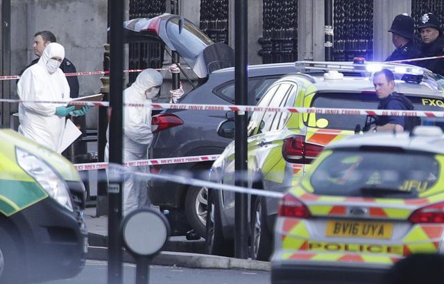 Police forensic officers at the scene close to the Houses of Parliament in London, Wednesday, March 22, 2017. (AP Photo) Police forensic officers at the scene close to the Houses of Parliament in London, Wednesday, March 22, 2017. (AP Photo)