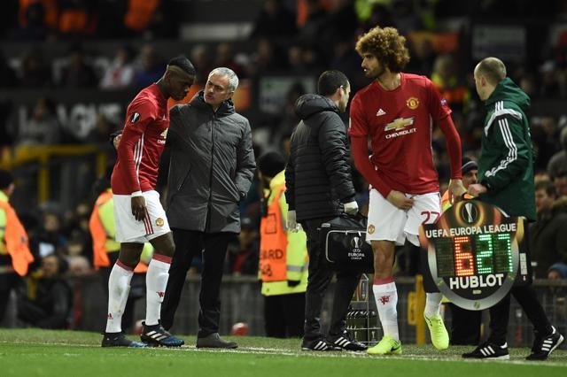 Manchester United's French midfielder Paul Pogba (L) talks with manager Jose Mourinho (C) as he leaves the pitch injured and substituted by Belgian midfielder Marouane Fellaini (R) during the UEFA Europa League round of 16 second-leg football match between Manchester United and FC Rostov at Old Trafford stadium in Manchester on March 16, 2017. (AFP) Manchester United's French midfielder Paul Pogba (L) talks with manager Jose Mourinho (C) as he leaves the pitch injured and substituted by Belgian midfielder Marouane Fellaini (R) during the UEFA Europa League round of 16 second-leg football match between Manchester United and FC Rostov at Old Trafford stadium in Manchester on March 16, 2017. (AFP)