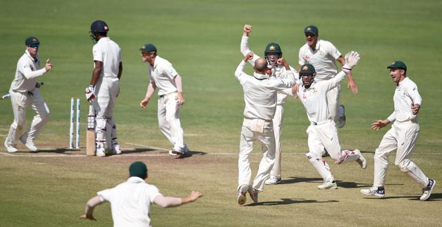 Australian players celebrate their victory against India in the first test in Pune. (PTI) Australian players celebrate their victory against India in the first test in Pune. (PTI)