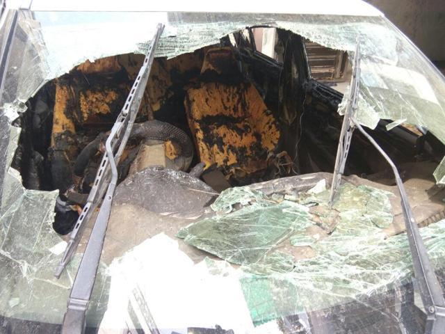 The car that caught fire in Krishna Vihar in Rohini on Thursday afternoon. The car that caught fire in Krishna Vihar in Rohini on Thursday afternoon.