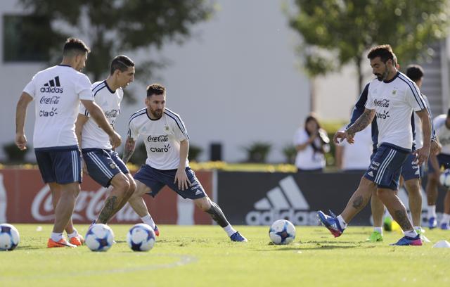 Argentina's from left to right, Sergio Aguero, Angel Di Maria, Lionel Messi and Ezequiel Lavezzi, attend a training session for their 2018 FIFA World Cup qualifying soccer match against Chile in Buenos Aires. (AP) Argentina's from left to right, Sergio Aguero, Angel Di Maria, Lionel Messi and Ezequiel Lavezzi, attend a training session for their 2018 FIFA World Cup qualifying soccer match against Chile in Buenos Aires. (AP)