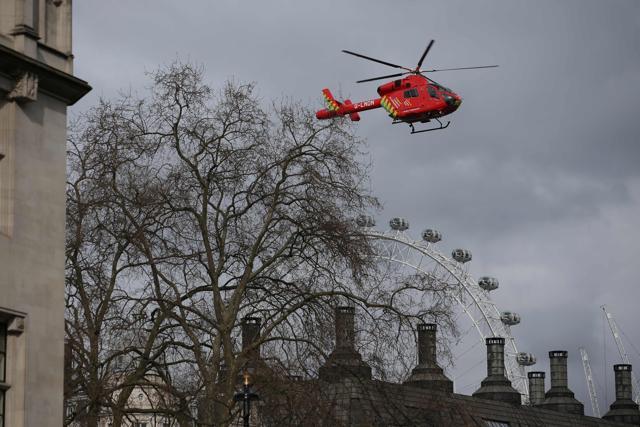An air ambulance flies above Portcullis House, next to the Houses of Parliament in central London. (AFP Photo) An air ambulance flies above Portcullis House, next to the Houses of Parliament in central London. (AFP Photo)