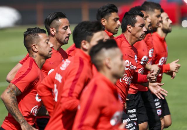 Chile's national soccer team take part in a training session in Santiago, Chile, Monday. Chile will face Argentina in a 2018 FIFA World Cup qualifying soccer match in Buenos Aires on March 23. (AP) Chile's national soccer team take part in a training session in Santiago, Chile, Monday. Chile will face Argentina in a 2018 FIFA World Cup qualifying soccer match in Buenos Aires on March 23. (AP)