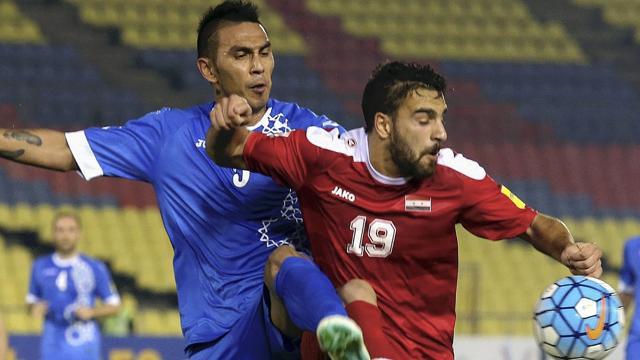 Syria and Uzbekistan players vie for the ball. (Twitter) Syria and Uzbekistan players vie for the ball. (Twitter)