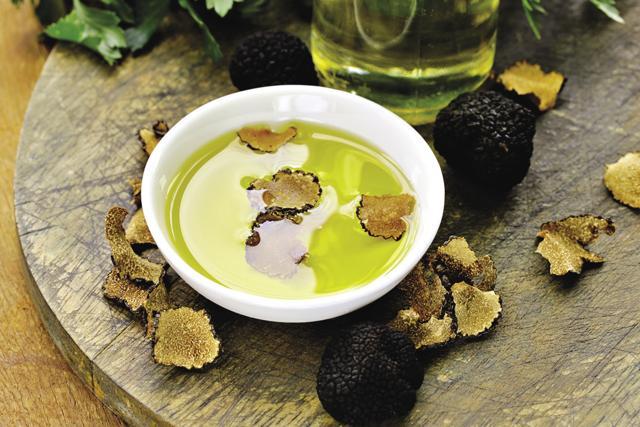Truffle oil usually has nothing to do with real truffles; a tiny proportion is made by infusing truffles into good olive oil (Shutterstock) Truffle oil usually has nothing to do with real truffles; a tiny proportion is made by infusing truffles into good olive oil (Shutterstock)