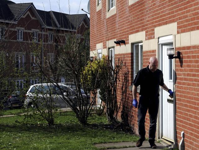 Police leave the house in Quayside where Khalid Masood lived, in Birmingham England. (AP Photo) Police leave the house in Quayside where Khalid Masood lived, in Birmingham England. (AP Photo)