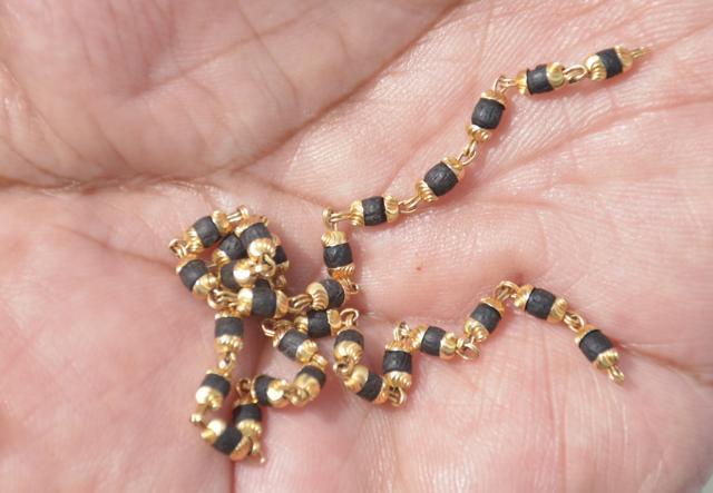 Though the woman was taken by surprise, she somehow held on to the chain, which broke and the snatchers sped away with a major portion of it — only a small piece was left in her hand (Sakib Ali/HT Photo)