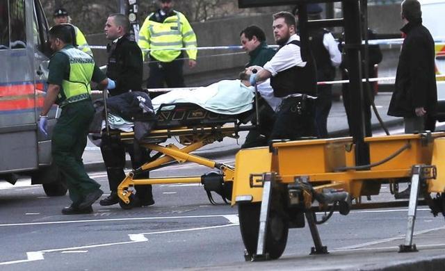 Members of the emergency services take an injured person away on a stretcher after an incident on Westminster Bridge in London. (Reuters) Members of the emergency services take an injured person away on a stretcher after an incident on Westminster Bridge in London. (Reuters)