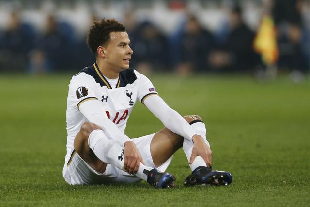 Tottenham's Dele Alli looks dejected after receiving the red card. (REUTERS) Tottenham's Dele Alli looks dejected after receiving the red card. (REUTERS)