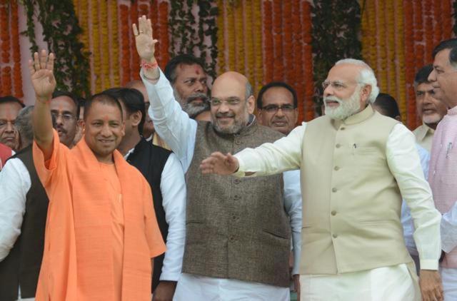 Yogi Adityanath sworn in as Uttar Pradesh chief minister at Smriti Upvan, in Lucknow, India, on March 19, 2017. Prime Minister Narendra Modi, BJP chief Amit Shah and others were present on the occasion. (Ashok Dutta/HT Photo) Yogi Adityanath sworn in as Uttar Pradesh chief minister at Smriti Upvan, in Lucknow, India, on March 19, 2017. Prime Minister Narendra Modi, BJP chief Amit Shah and others were present on the occasion. (Ashok Dutta/HT Photo)