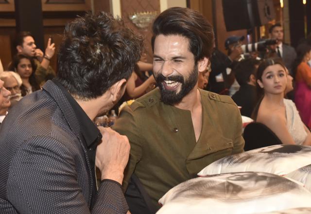 Shahid Kapoor shares a light moment while Alia Bhatt looks on. (Pratik Chorge/HT Photo)