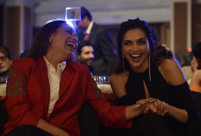 Rani Mukerjee and Deepika Padukone sharing a joke. (Anshuman Poyrekar/HT Photo)
