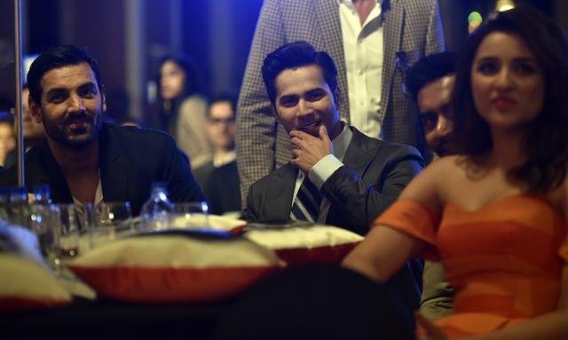 John Abhraham, Varun Dhawan and Parineeti Chopra shared a table. (Anshuman Poyrekar/HT Photo)