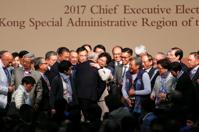 Carrie Lam is congratulated after she wins the election for Hong Kong's chief executive. (Reuters Photo)