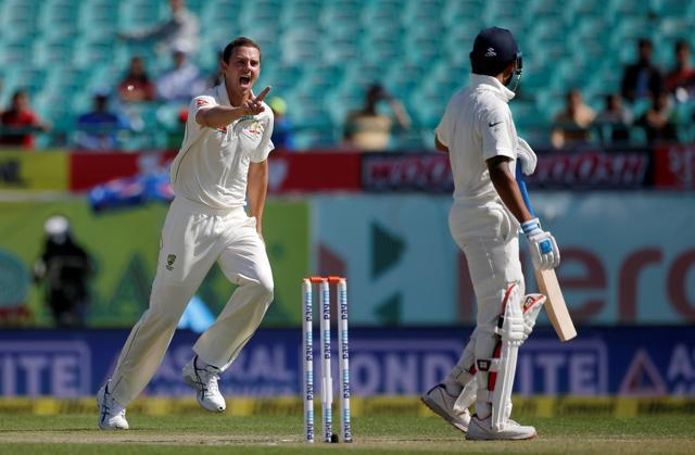 Australia's Josh Hazlewood celebrates after dismissing India's Murali Vijay. (REUTERS) Australia's Josh Hazlewood celebrates after dismissing India's Murali Vijay. (REUTERS)