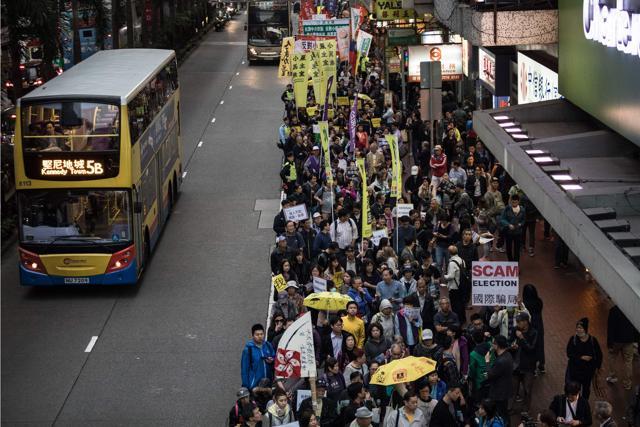 Protesters attend a pro-democracy rally in Hong Kong. (AFP Photo) Protesters attend a pro-democracy rally in Hong Kong. (AFP Photo)