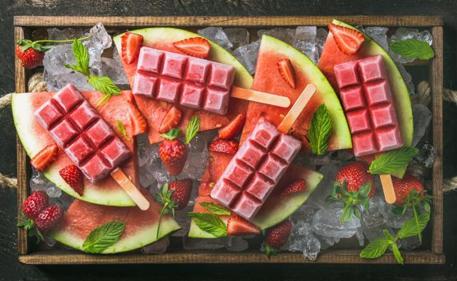 Watermelon and strawberry popsicles. (iStockphoto) Watermelon and strawberry popsicles. (iStockphoto)