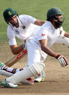 Theunis de Bruyn (L) is run out after he and Hashim Amla (R) of South Africa run into each other during day four of the third Test cricket match between New Zealand and South Africa at Seddon Park in Hamilton on Tuesday. (AFP) Theunis de Bruyn (L) is run out after he and Hashim Amla (R) of South Africa run into each other during day four of the third Test cricket match between New Zealand and South Africa at Seddon Park in Hamilton on Tuesday. (AFP)