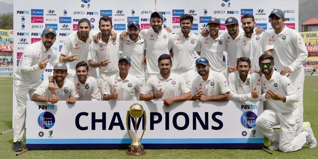 Team India with the Border-Gavaskar Trophy after beating Australia in Dharamsala on Tuesday. (PTI)