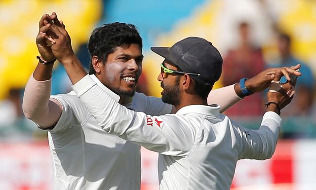 Umesh Yadav (L) celebrates the dismissal of Australia's Nathan Lyon. (REUTERS) Umesh Yadav (L) celebrates the dismissal of Australia's Nathan Lyon. (REUTERS)
