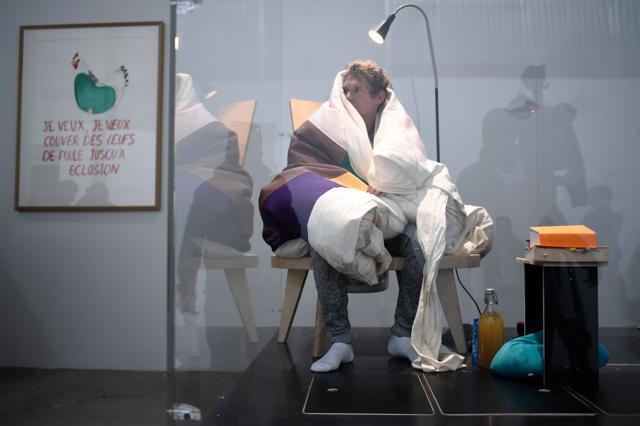French artist Abraham Poincheval has been avoiding eye contact with the crowd gathered around the glass case. (AFP Photo) French artist Abraham Poincheval has been avoiding eye contact with the crowd gathered around the glass case. (AFP Photo)