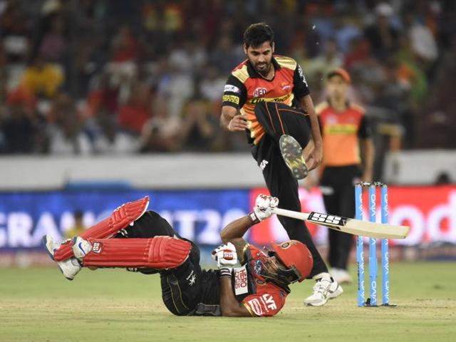 Sunrisers Hyderabad’s Bhuvneshwar Kumar runs towards a Royal Challengers Bangalore player at Rajiv Gandhi International Cricket Stadium, Hyderabad on April 26, 2016.  (Sanjeev Verma/ HT Photo) 