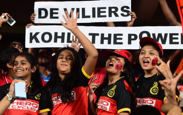 RCB fans with posters cheering for Virat Kohli and AB de Villiers. (PTI)