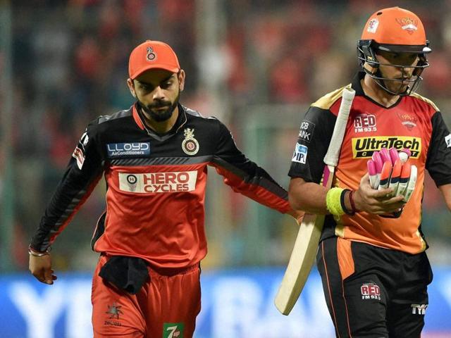 Yuvraj Singh is patted on the back by Virat Kohli as he returns to the pavilion after his dismissal. (PTI)