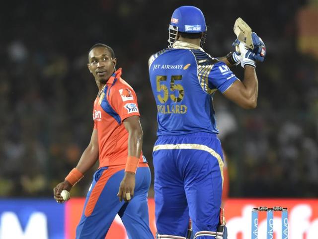 A Trinidadian tussle: Gujarat Lions’ bowler Dwayne Bravo during a heated conversation with Keiron Pollard of Mumbai Indians during their IPL encounter at the Green Park stadium in Kanpur on May 21, 2016. (Mohd Zakir/ HT Photo) 