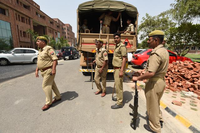 Police personnel deployed at Sharda university in Greater Noida on Tuesday. (Virendra Singh Gosain/HT Photo) Police personnel deployed at Sharda university in Greater Noida on Tuesday. (Virendra Singh Gosain/HT Photo)