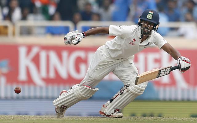 India's Wriddhiman Saha watches the ball after playing a shot during the fourth day of their third test cricket match against Australia in Ranchi. (AP) India's Wriddhiman Saha watches the ball after playing a shot during the fourth day of their third test cricket match against Australia in Ranchi. (AP)