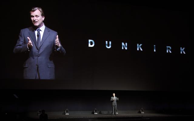 Christopher Nolan, director of the upcoming film Dunkirk, discusses the film onstage during the Warner Bros. Pictures presentation at CinemaCon 2017. (Chris Pizzello/Invision/AP) Christopher Nolan, director of the upcoming film Dunkirk, discusses the film onstage during the Warner Bros. Pictures presentation at CinemaCon 2017. (Chris Pizzello/Invision/AP)