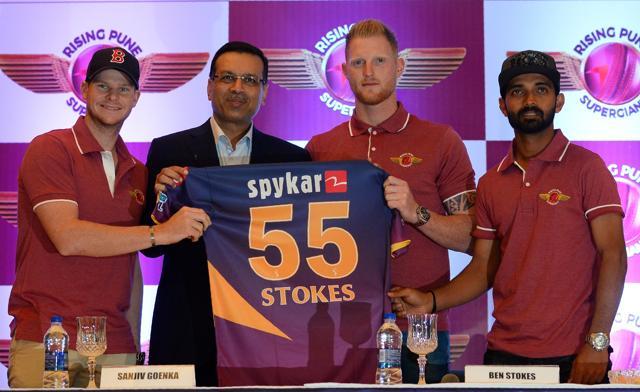 Rising Pune Supergiant cricket team captain Steve Smith (L), team owner Sanjiv Goenka (2L) and player Ajinkya Rahane (R) pose for a photograph with a team jersey as they welcome England's Ben Stokes (2L) to the team during a press conference in New Delhi on Thursday. (AFP)