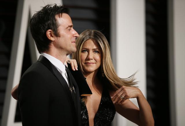 Jennifer Aniston and Justin Theroux at the Oscars Vanity Fair Party. (REUTERS)